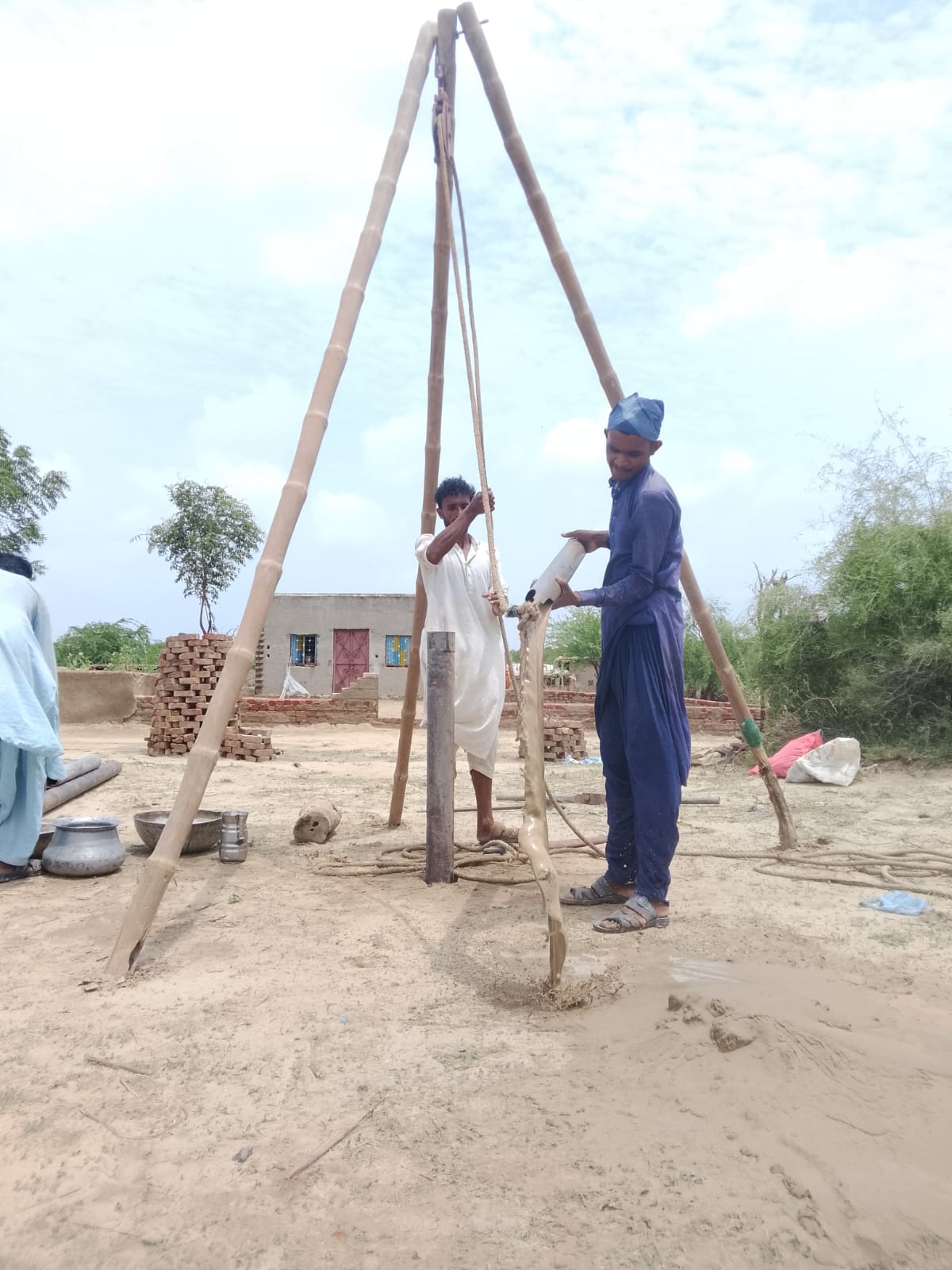 Workers drilling the borehole for the new well